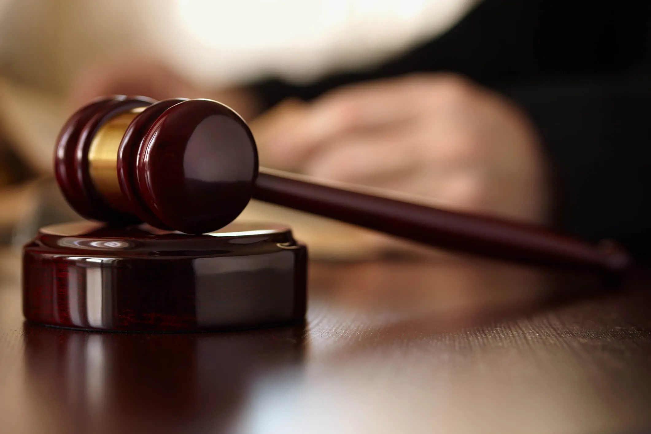 Judge and gavel in a courtroom.