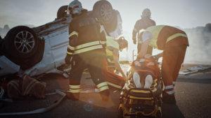 Ambulance helping injured motorist